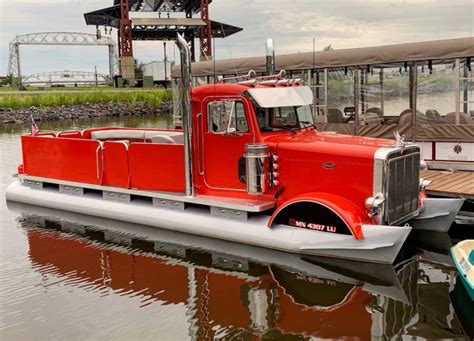 With a similar concept to the Peterboat, the Petertoon is built around a 28 foot pontoon with a Peterbilt truck body rigged on top. The boat has a fully functional compressed air horn (so its loud), and is powered by a 90 hp Mercury outboard.. 
