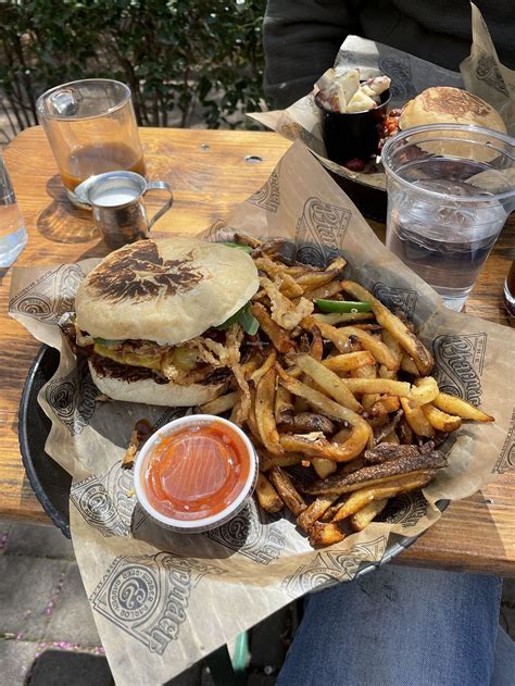 Pharmacy burger nashville. The Pharmacy has long been an East Nashville staple, but nowadays guest can find the burger joint downtown and as soon as you arrive to town. “We literally just got off the plane and this is our ... 