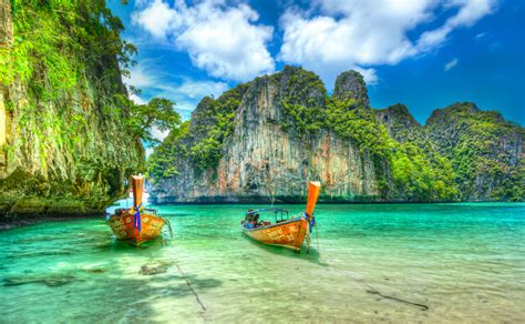 Phi thai. Keep reading for the top beach resorts in Phi Phi Islands, Thailand. 1. SAii Phi Phi Island Village, Phi Phi Don (from USD 292) Nestled amidst 70 acres (28.33 hectares) of flourishing coconut palm plantations, this beach resort is a tranquil oasis in the secluded Loh Ba Gao Bay. 