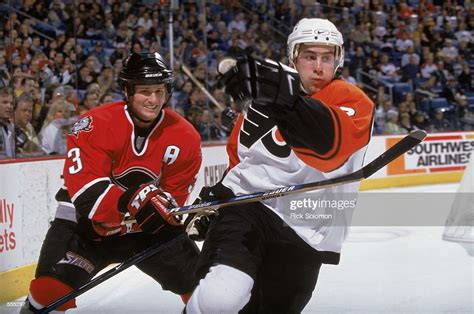 Philadelphia Flyers left wing Simon Gagne fires the puck into the …