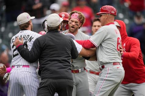 Phillies’ Bryce Harper ejected after charging Rockies dugout