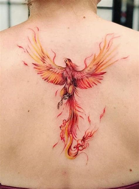 61 Spectacular Phoenix Tattoos For Women. 1. Rising To The