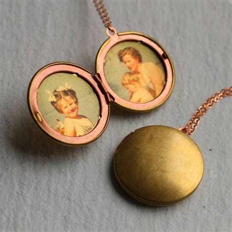 Photo of locket. Reversible Square Kingman Turquoise Barre Photo Locket. $9,200 at shermanfield.com. It’s a two-in-one locket with a bright Kingman turquoise stone on one side and classic gold lines on the other ... 
