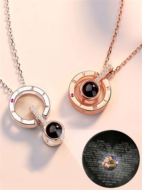 Photo projection necklace. Experience the magic of our Projection Necklaces collection - a perfect union of style and sentimentality. Using advanced projection technology, each necklace elegantly encapsulates a special photo, hidden until lit up with light. Crafted from high-quality materials, these necklaces make your memories wearable, serving 