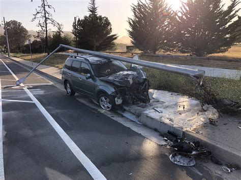 Photos: Car crashes into light pole in San Rafael