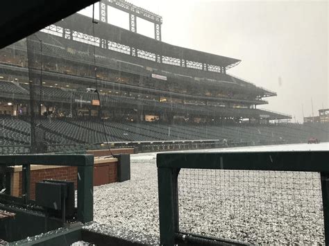 Photos: Coors Field covered in hail