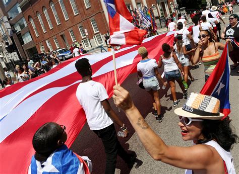 Photos: Puerto Rican Festival of MA Parade rolls through Boston