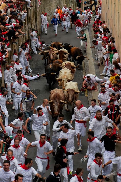 Photos: Thousands take part in San Fermín Festival’s running of the bulls in Pamplona