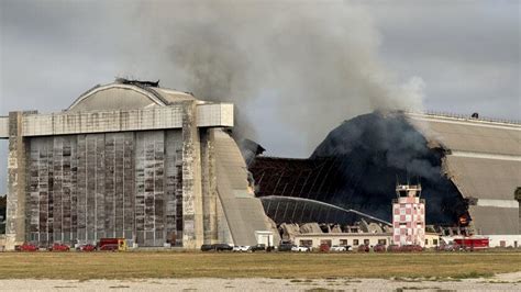 Photos: World War II-era hangar in Orange County burns in massive fire