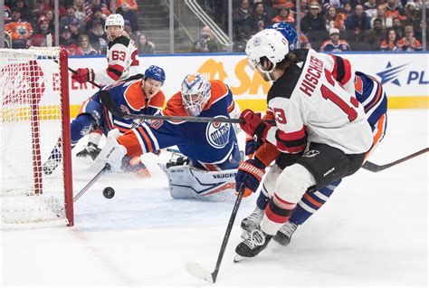 Pickard makes 26 saves for 1st NHL victory in almost 2 years, streaking Oilers beat Devils 4-1