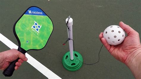 Pickleball rebounder. Saw this pickleball rebounder today. But at $350 I’m more interested in a DIY option. Anyone have any idea of what the surface might be made of? It looks like it has really good bounce to it compared to a lot of outdoor walls I’ve used. Judging by the pictures, looks like it’s made of ping pong table material. 