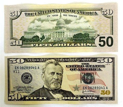 Picture of a $50 bill. This image, provided by the National Intelligence Service on Monday, shows a counterfeit $50 bill (bottom) and a real one in comparison. (NIS) 