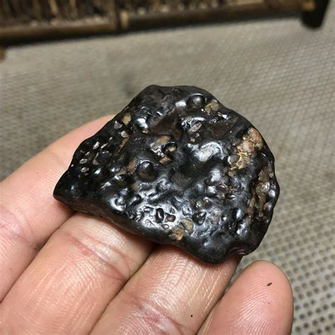 Meteorites have other, less common, origins. Meteor impacts on the moon or Mars can eject surface material into space that ends up on Earth. Last year a 10.5-ounce meteorite that originated on .... 