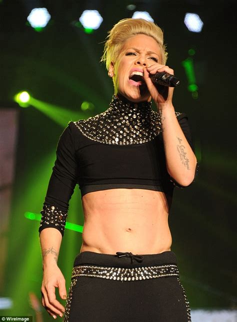 Pictures of pinks ass. .  The 33-year-old singer flaunted her six-pack abs...