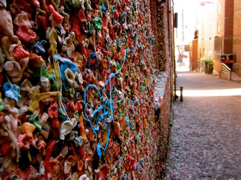Pikes market gum wall. The landmark bubble gum wall near the Pike Place Market in Seattle is a dirty, unhygienic wall filled with half-chewed bubble gum that is dripping from every surface. Seattle Washington famous gum wall detail. Gum Wall at Seattle. Seattle famous gum wall. Vintage Desktop Wallpaper concept. Seattle, Washington - June 30, 2018 : The Market … 