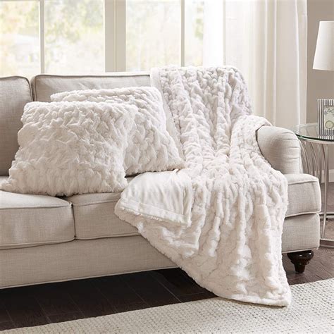 Pillow and blanket. Are you looking to add warmth and comfort to your home while also indulging in a relaxing and creative activity? Look no further than knitting your own cozy blanket. The classic ga... 