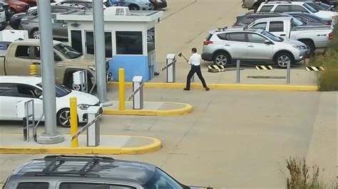 Pilot accused of destroying parking barrier at DIA with an ax says he hit breaking point