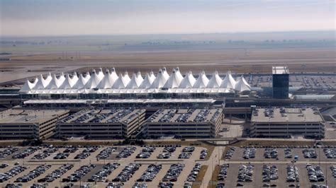 Pilot accused of destroying parking barrier at Denver airport with an ax says he hit breaking point