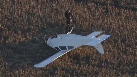 Pilot forced to make emergency landing in farm field in Lowell
