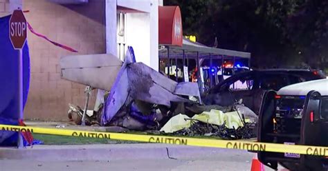 Pilot killed in small plane’s fiery crash into Texas shopping center parking lot, official says