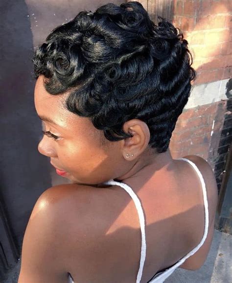 Pin Curls Pixie Cut. Opt for ruffled or layered pin curls on your pixie cut to give it an edgy look. Check out more pixie cut hairstyles on our Pinterest page. Follow Us. 30 Pixie cut haircuts and hairstyles for black women looking to get a big chop or rock their short hair from curly pixie cuts to wavy pixie cuts.. 