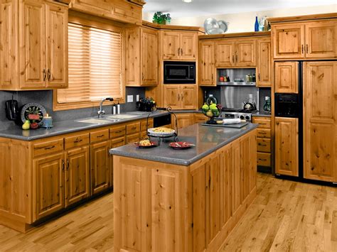 Pine cabinets. Pine continues to be a go-to wood choice for kitchens across the country. Known for its straight graining and occasional knots, pine takes quality stains and paints beautifully. You can customize all the pine kitchen furniture you purchase from AmishOutletStore.com. Another valuable asset of pine wood is its affordability. 