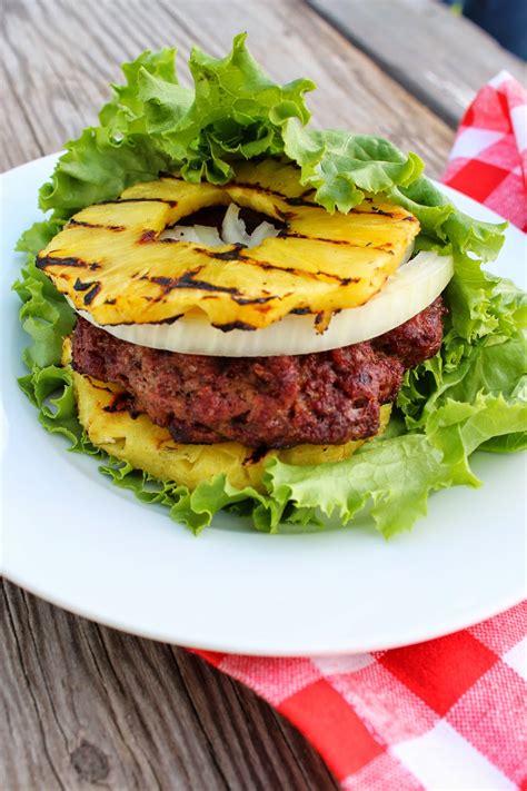 Pineapple burger. Cook bacon to your liking. Place pineapple rings on the barbeque to heat through at the same time. If adding egg to your burger this is the last item to be placed on the barbeque for cooking. Cook to your liking, solid or with a runny yolk. Place split hamburger buns on the grill of your barbeque to toast. 