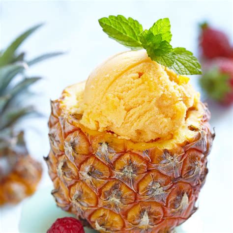 Pineapple ice cream. 6. Add 1 cup of heavy whipping cream , 2 tbsps of granulated sugar, and optionally 1 tsp of vanilla extract to a large mixing bowl. Use a hand mixer to whip the cream until soft peaks form. 7. Add the cooled pineapple paste to the whipped cream, use a hand mixer to whip the mixture until stiff peaks form. 8. 