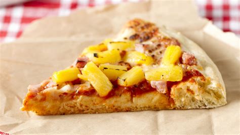 Pineapples on pizza. Just 5 ingredients. Yay! I love recipe like this! First you butter a 12-inch cake pan and sprinkle with brown sugar. Add fruit in the famous pineapple upside-down kind of a way. Top with pizza dough and brush with melted butter. Bake for 20 minutes at 400°F. Cool slightly and invert onto a 12-inch pizza pan. Slice it up just like a pizza pie! 