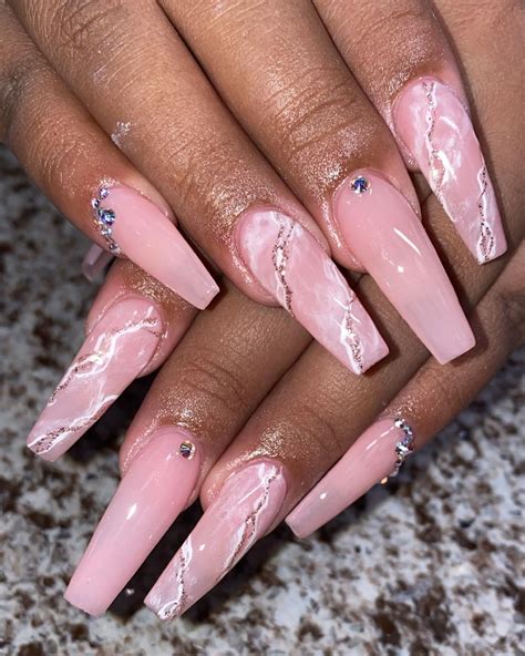 Pink acrylic nail designs. 1. Dry Pressed Flowers On An Acrylic Nail. Pinterest. Talk about pretty nails! This design exuberates beauty. It is done using real pressed flowers. These flowers are … 