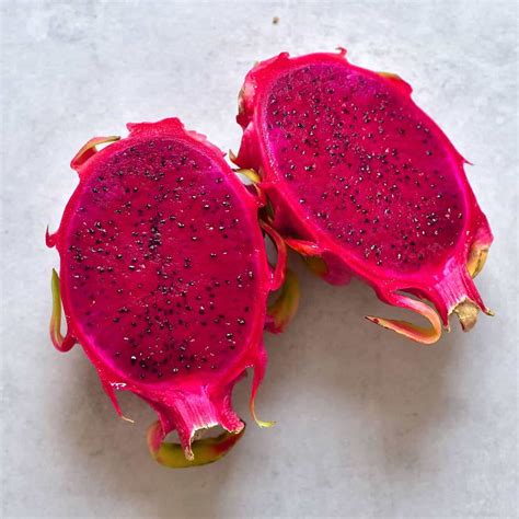 Pink dragonfruit. Fresh dragon fruit contains about one gram of fiber per 100 grams whereas dried dragonfruit packs in about 10 grams per 100 grams, making it a great high-fiber food. To get a bit more fiber, you can even eat the skin and seeds of the pitaya. Another reason dragon fruit benefits digestion is due to the oligosaccharides it contains. 