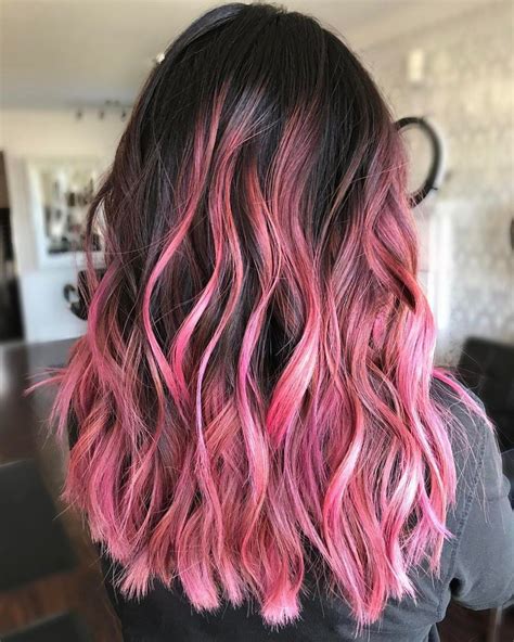 Pink highlights for dark hair. May 18, 2018 · Honey Rose Balayage for Dark Hair. This is the evolution of rose gold hair color. It’s a warm, luscious combination of rich toffee brown and sparkling peach/pink highlights. Matrix pros are predicting this will be the most-requested highlight color for dark hair this season! 