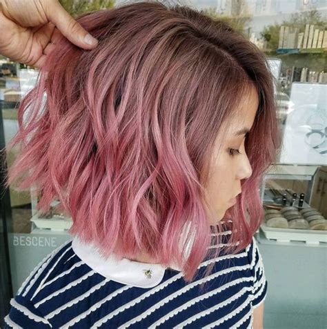 No color can be hot and scintillating as the color pink. Women with short hair must try this color to accentuate their boldness and make them look a lot edgier. We suggest choosing a short asymmetric bob hairstyle that flatters the color. You can even go for a mix of various shades that perfectly define the ombre hair.. 