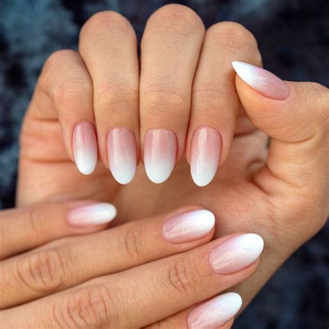 Pink white nails. White Hot. @heluviee / instagram. Put a pink spin on a standard French manicure by adding a thin pink stripe to the base of your tip. It still has that classic vibe but with a pretty pop. Play with different shades of pink to see what works for you, or mix it up on each nail. 06 of 24. 