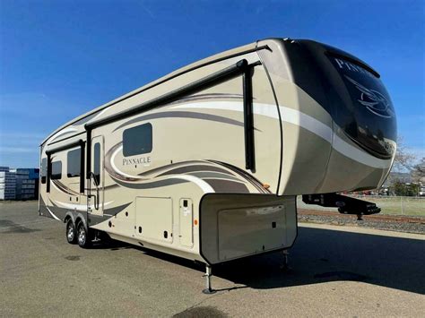 Pinnacle 5th wheel. Pinnacle, Jayco RV: Elevate your family's road trips for years to come with the Pinnacle luxury fifth wheel line from Jayco. The Pinnacle's hardwood cherry cabinets and trim, stainless steel fixtures and brand-name furniture will take your family's fun to the next level of luxury. (1) JAYCO 32RLTS. 