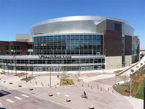 Pinnacle bank arena in lincoln. Pinnacle Bank Arena is an indoor facility in the West Haymarket district of Lincoln, Nebraska adjacent to The Canopy and the new home of the University of Nebraska Cornhuskers men's and women's basketball teams. With a seating capacity of roughly 16,000, the arena is a state-of-the-art multi-purpose venue that offers year-round … 