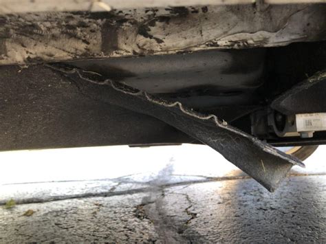 Pipe hanging underneath car.  It&rsquo;s near the front of the car in the middle.  A...