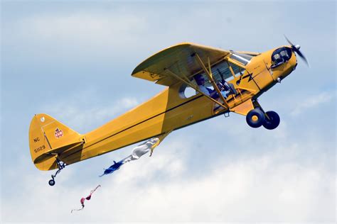 Piper Cubs are still flying high; Fans celebrate plane at EAA ...