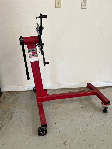 Pittsburgh 1 ton engine stand. Pittsburgh Automotive engine stand has got a 1 ton (2000 lb) capacity and can be used to store larger engine blocks on the stand. This engine stand has got a strong construction when compared to stands with lower storage capacities and is very stable even when holding a large engine block. 