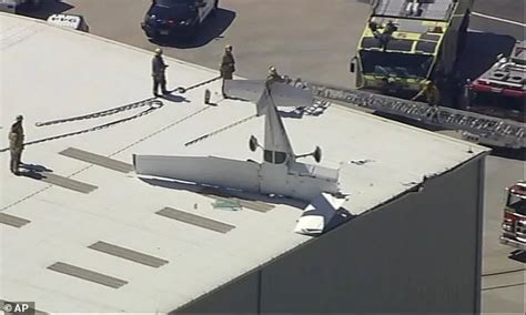 Plane crashes into hangar at Long Beach Airport, pilot survives
