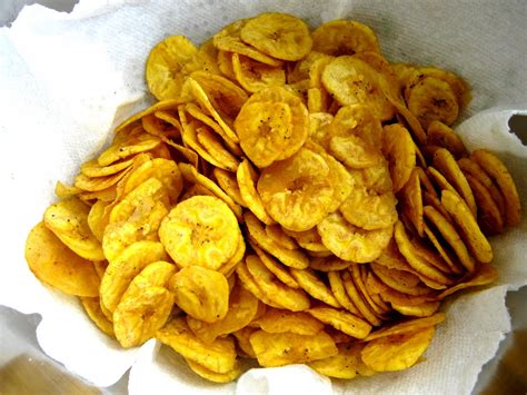 Plantain chips. Baking method. Preheat oven to 375 F. After cutting into thin slices as stated above, put the slice in a bowl add about one tablespoon of oil (for the 3 Plantains) Toss till Plantain slices are well coated. Arrange the slices on a … 