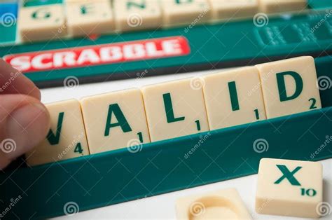 Plastic Letters on Scrabble Board Game Forming the Word Valid