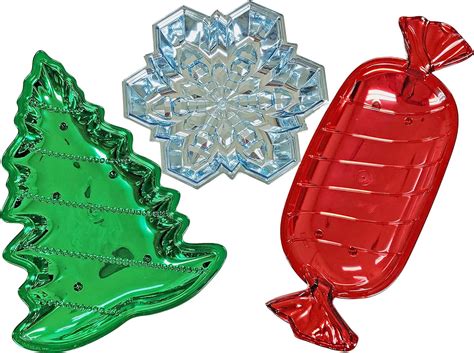 Plastic christmas trays at dollar tree. The supplies you will need to get from the Dollar Tree are: 1. Large silver plastic tray . 2. Pizza pan . 3. Cake pan . 4. Glass salt and pepper shaker set . 5. Wine glass. You will also need to get some E6000 glue. I added the E6000 glue to the top rim of the glass. You will place the glass onto the large silver plastic tray. 