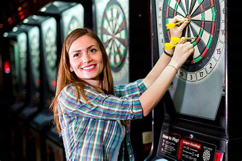 Play darts at The Players Lounge