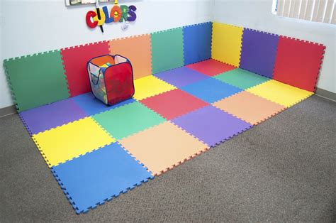 Play tiles. Burke Tiles are square playground surfacing available in a variety of colors to create patterns and accents. 