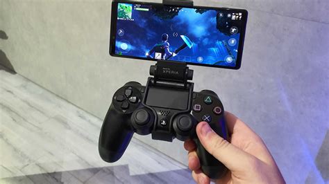 Playstation controller for phone. Customers find the comfort of the phone accessory to be intuitive, responsive, and comfortable in the hand. They also say the ergonomics are much better than other mobile controllers, making it easy to play games comfortably. The backbone doesn't feel janky or clunky at all, and the trigger buttons feel just like a PlayStation controller. 