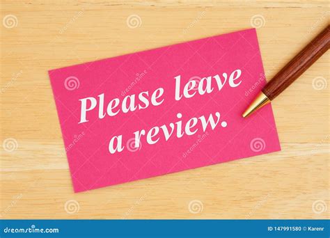 Please Leave a Review Text on Pink Card with Pen Stock Photo Image of