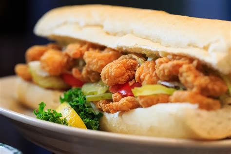 Poboys - Learn about the origin and evolution of the po-boy, a classic French bread sandwich filled with fried seafood, meat, or cheese. Find out where to get the best po-boys in the French Quarter and beyond.