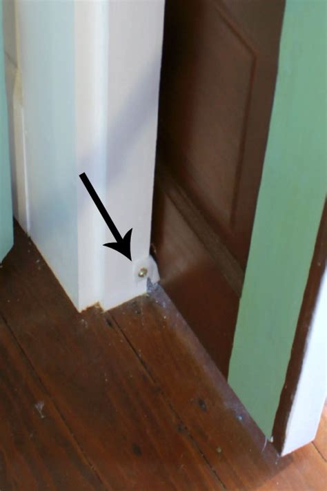 Pocket door framing guide.  Fixed position stabilizes door.  Plastic guide installs i...