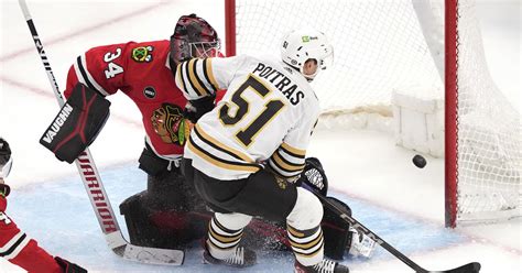 Poitras and Frederic help undefeated Boston Bruins blank Chicago Blackhawks 3-0